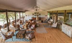 Traditional tented bush camp overview beside the Mara River at Entim Main Camp