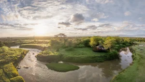Aerial view of Ol Pejeta Bush Camp tents along the Ewaso Nyiro River